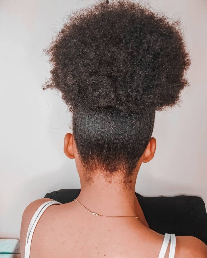 a girl that her root hair is stretched and packed up