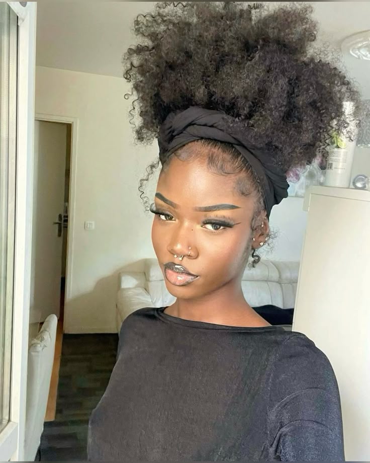 a girl with scarf with puff