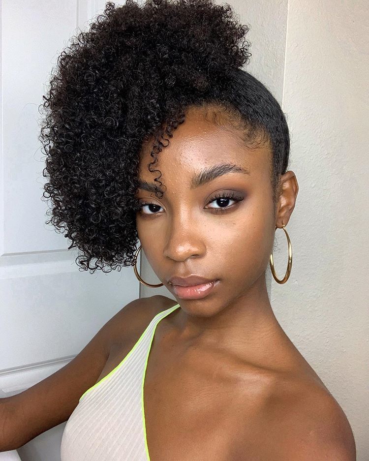 a girl that packed her hair to the side