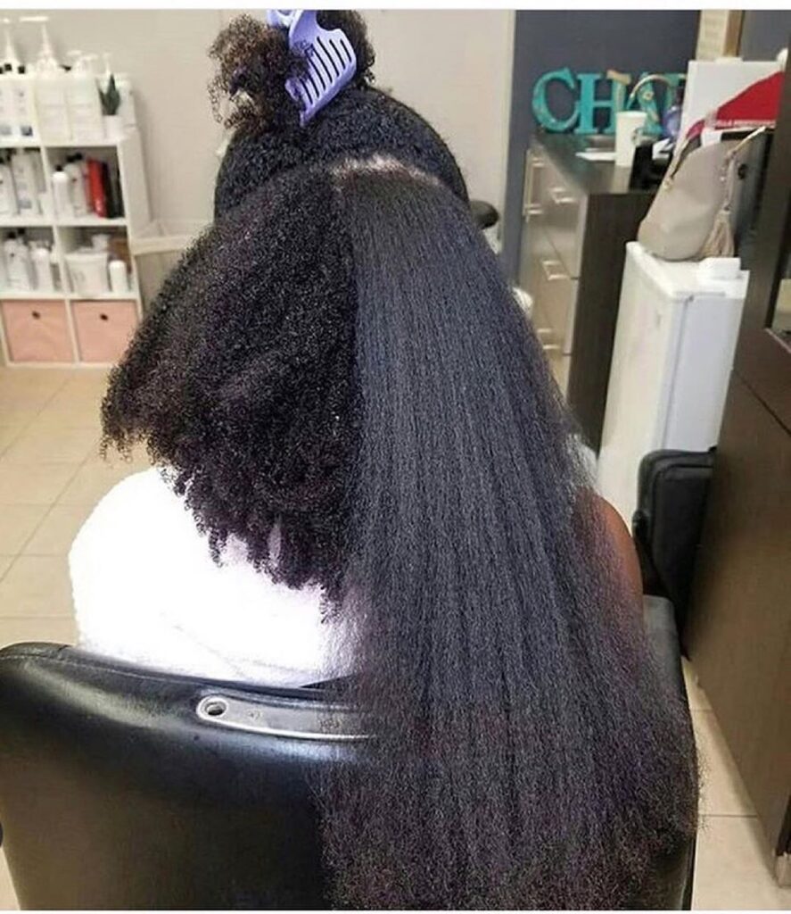 someone stretching her hair