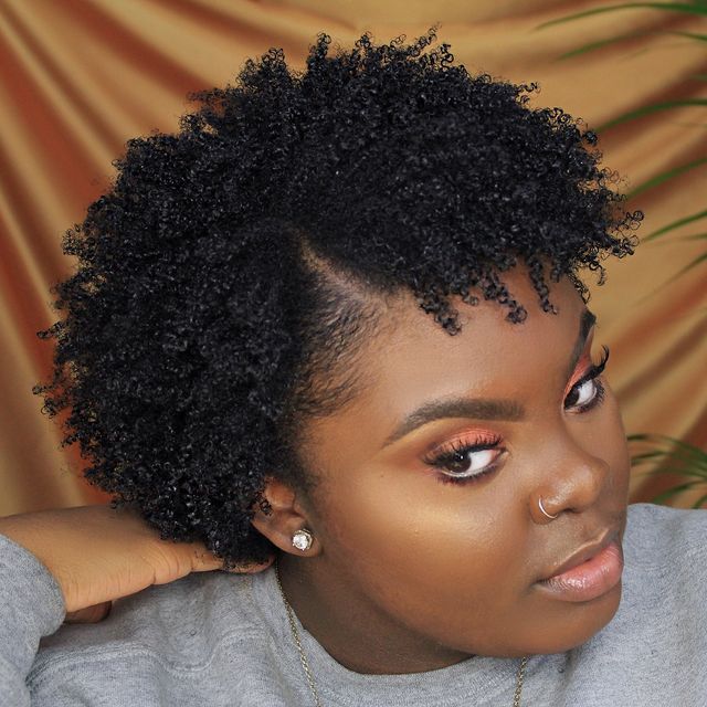 a lady with tiny curl pattern