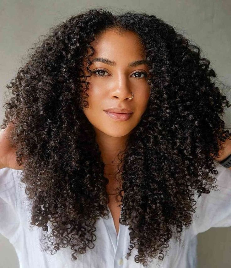 a girl with type 4A hair