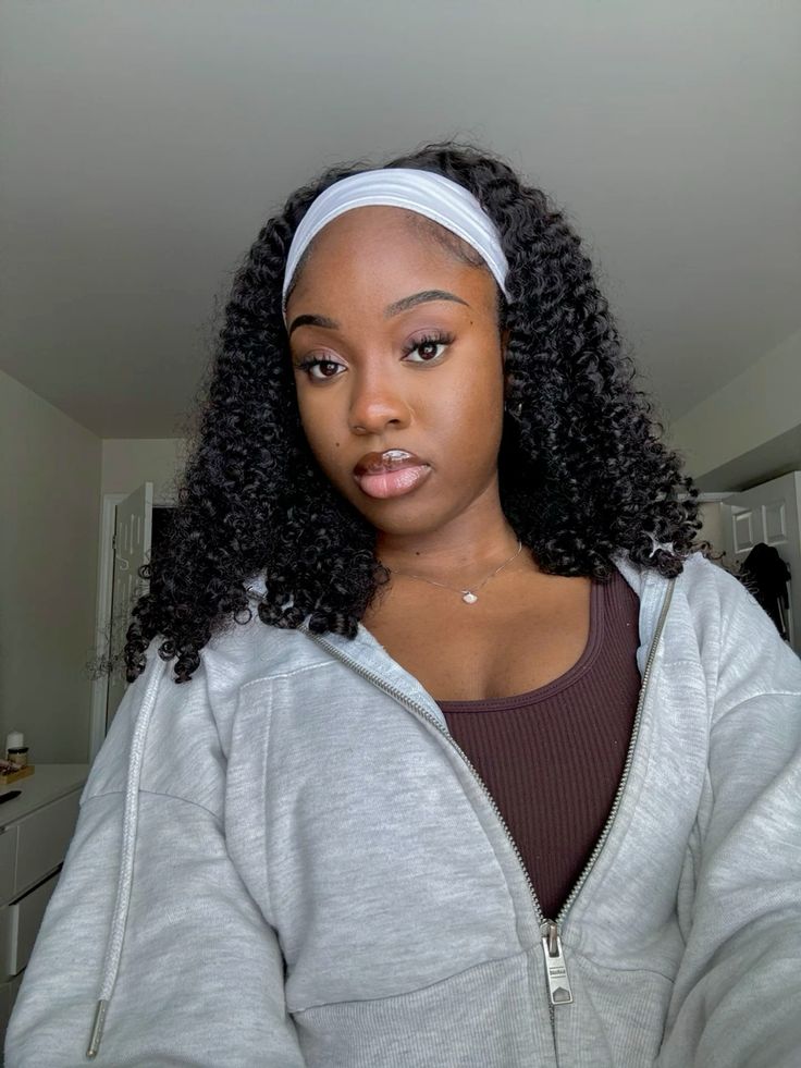 a young lady with wash and go with headband