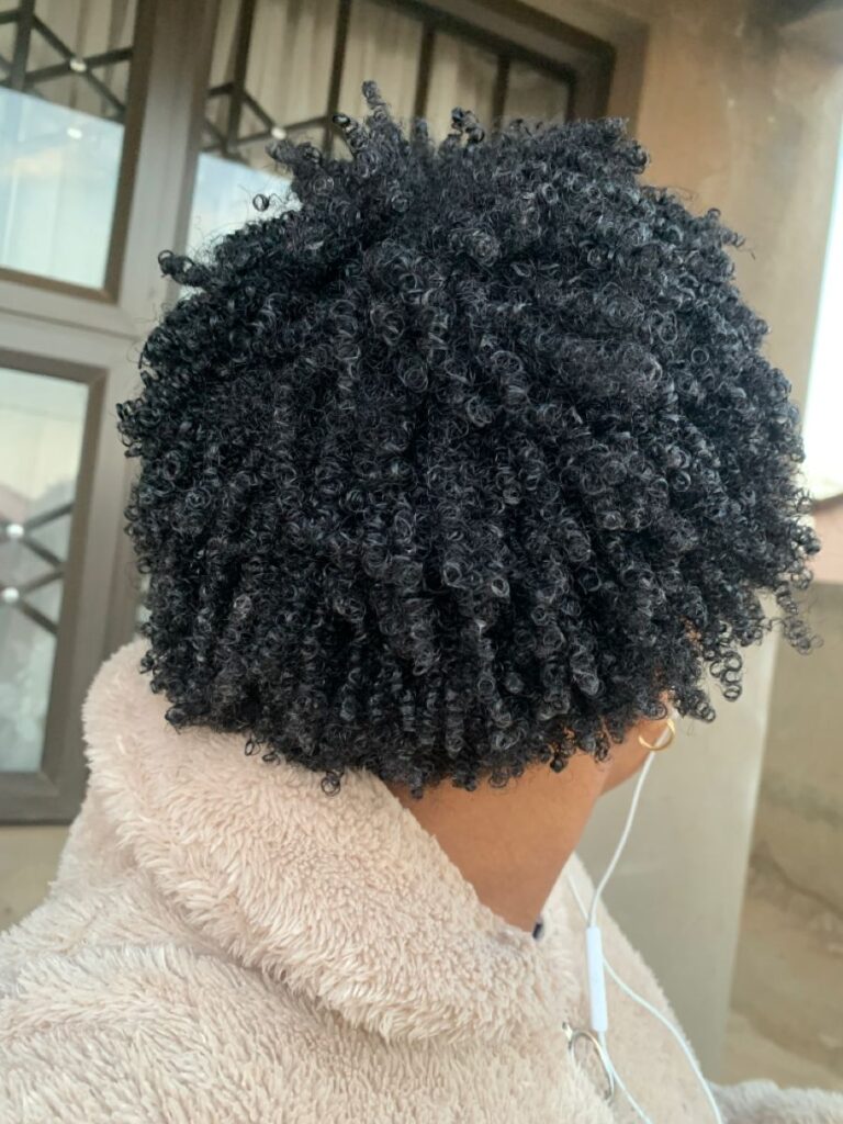 Picked roots adding volume to one of the best wash and go hairstyles.