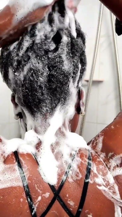 a lady washing her hair