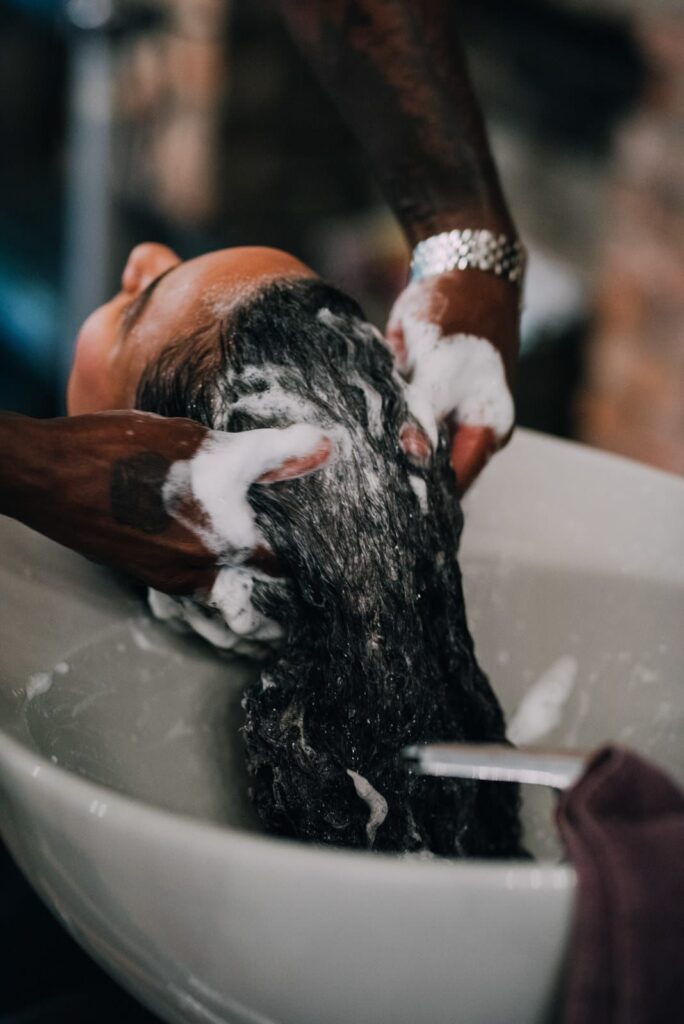 someone washing her hair