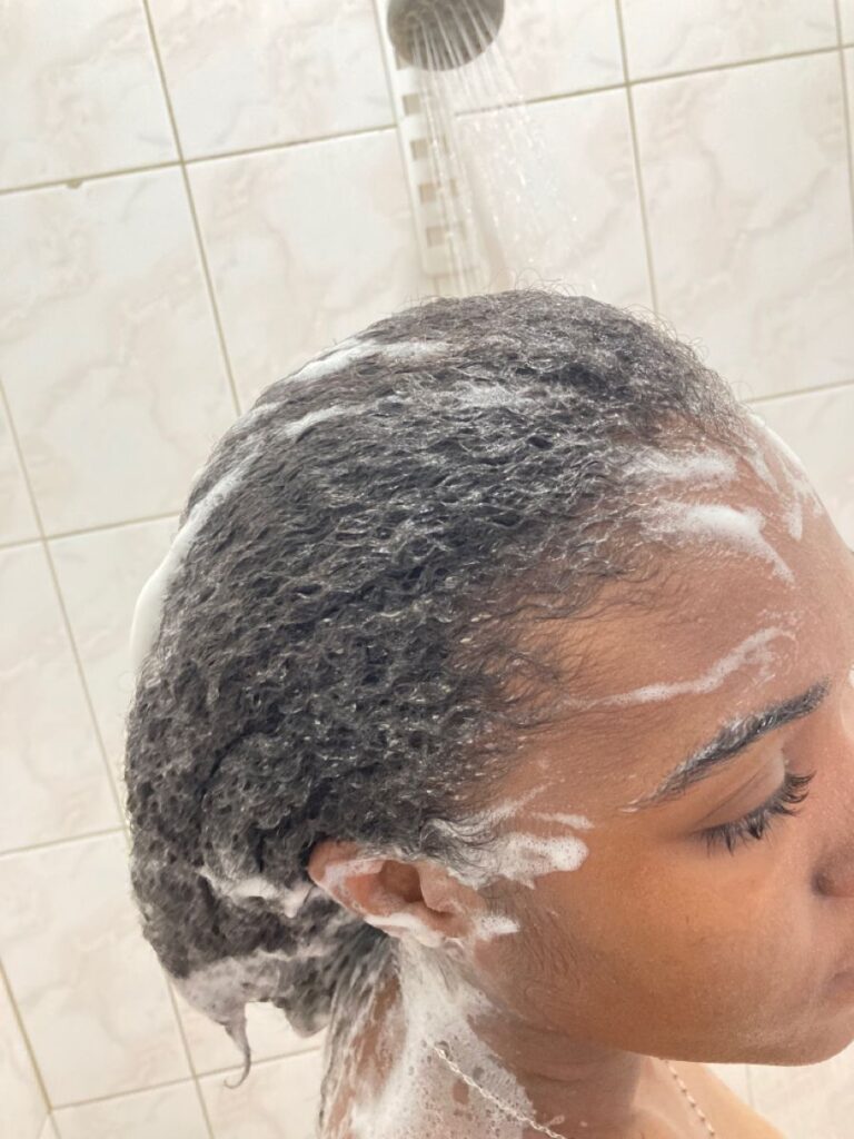 someone washing her hair