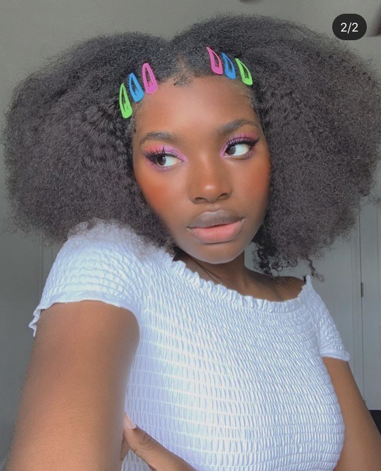 someone with colorful barrettes