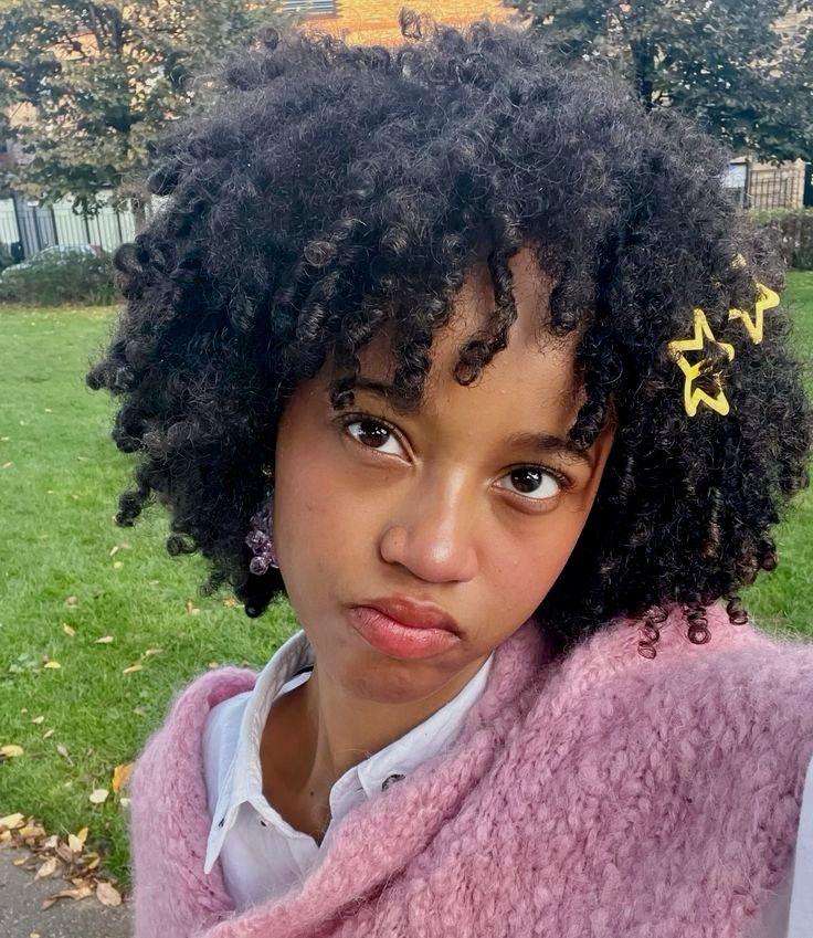 someone with hair with soft baby curls