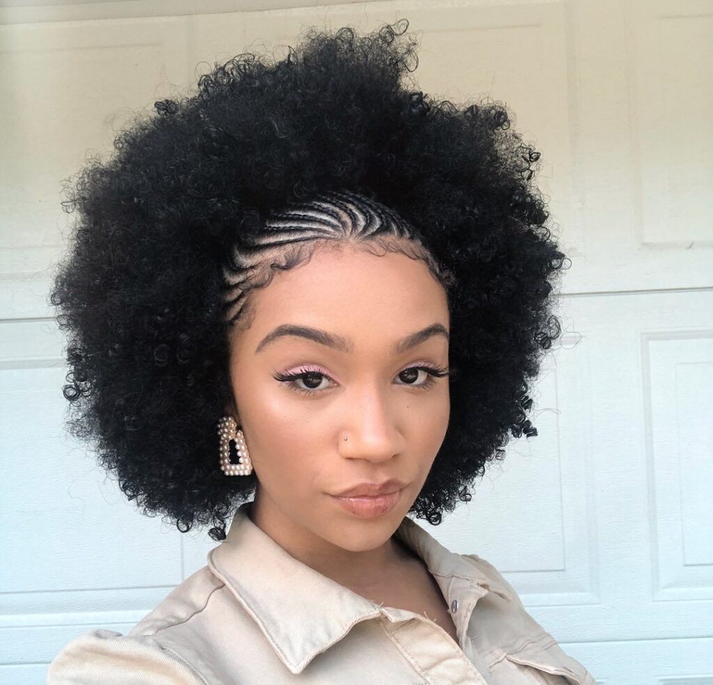 someone with natural hair with twisted crown