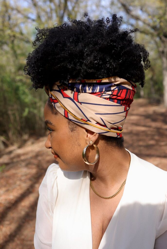 someone with vintage scarf print