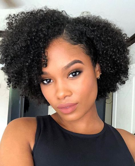 afro with a side part afro hairstyle