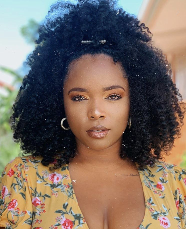 someone with  half up natural hair