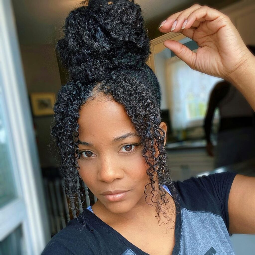 someone with natural hair high bun