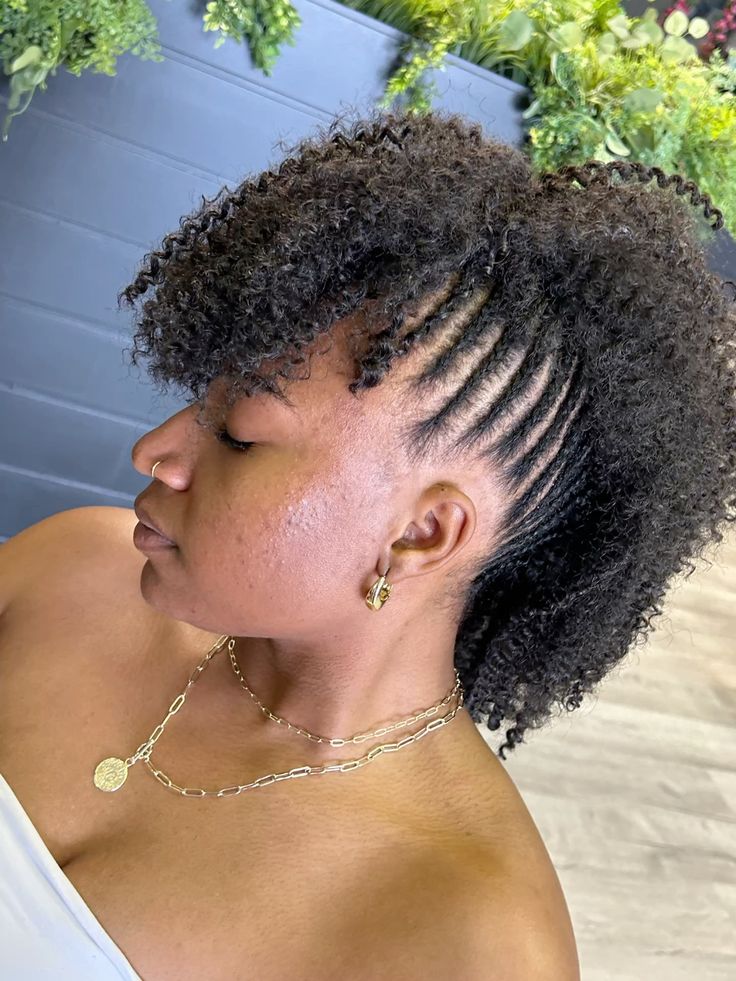 someone with braid out mohawk