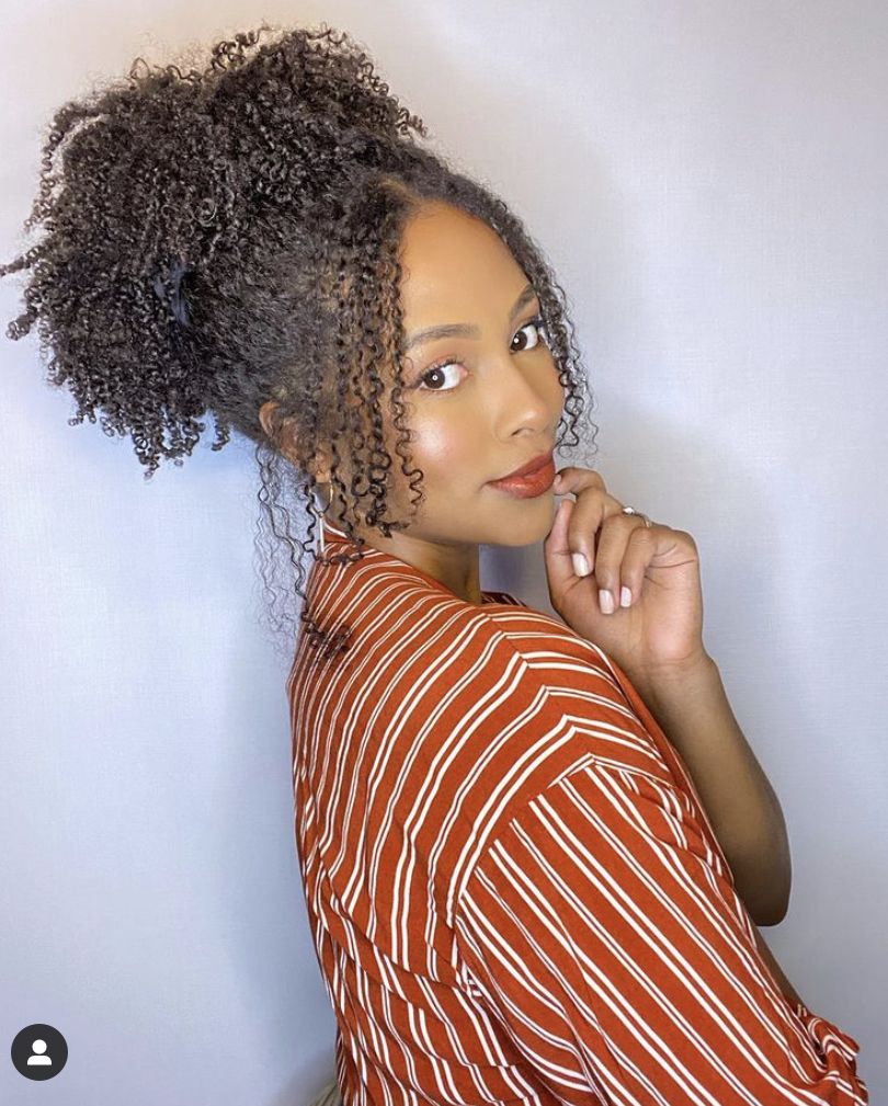 someone with natural hair pineapple puff