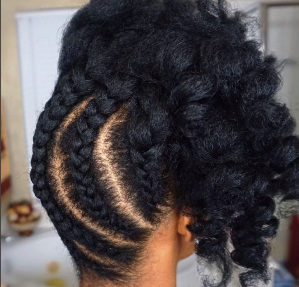 someone with natural hair updo
