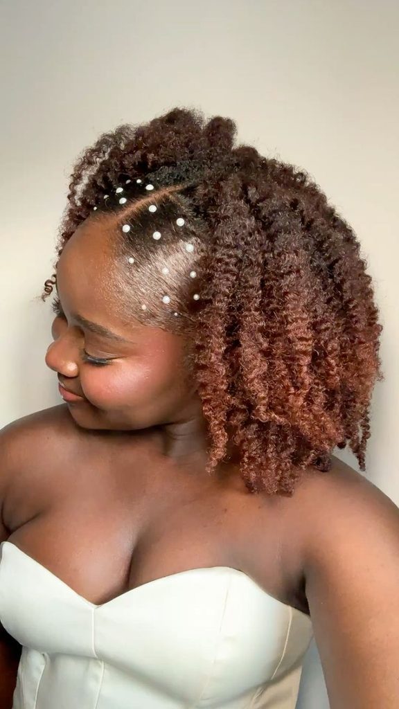 someone with braid out afro wedding hairstyle