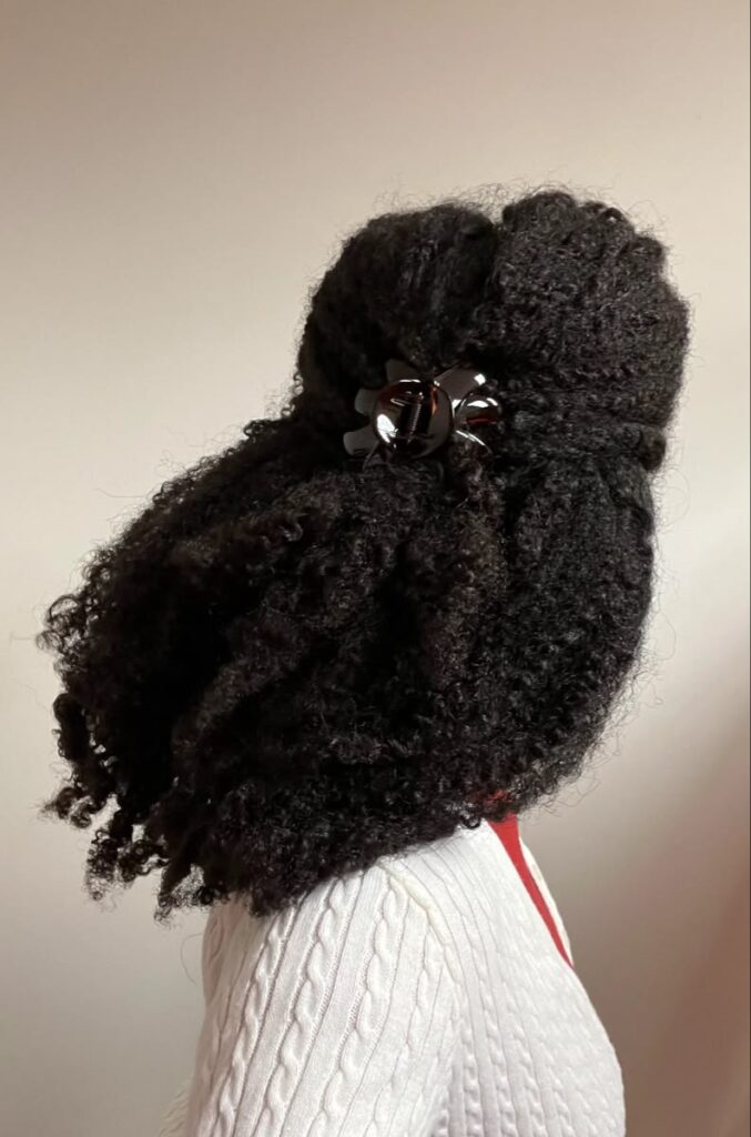 someone with curl updo for work