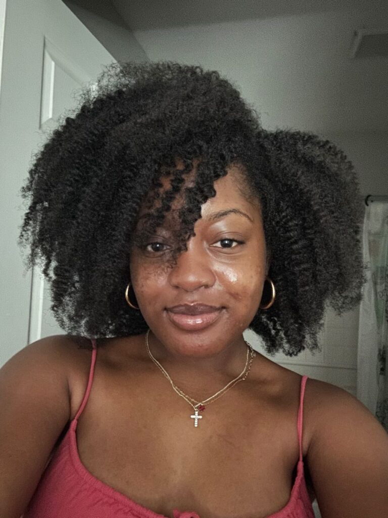 someone with braid out with side part