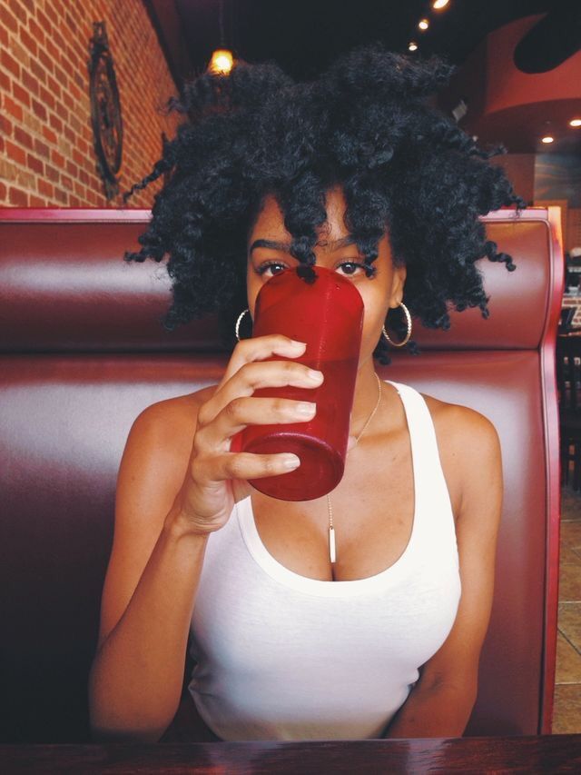 someone with chunky twist out on a TWA for every hair length