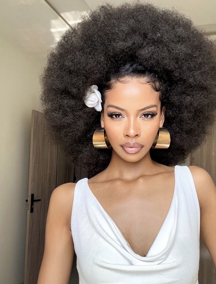 someone with classic round afro wedding hairstyle