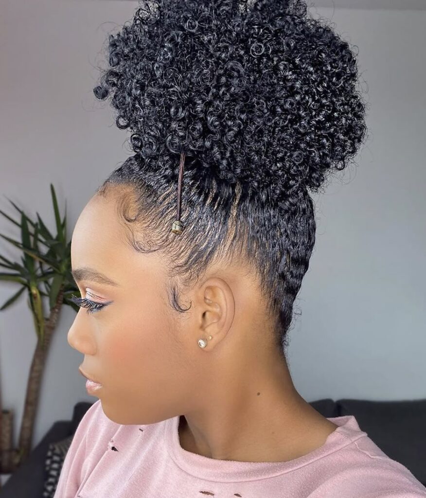 someone with curly puff
