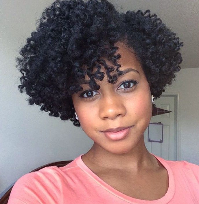 someone with defined twist out hair