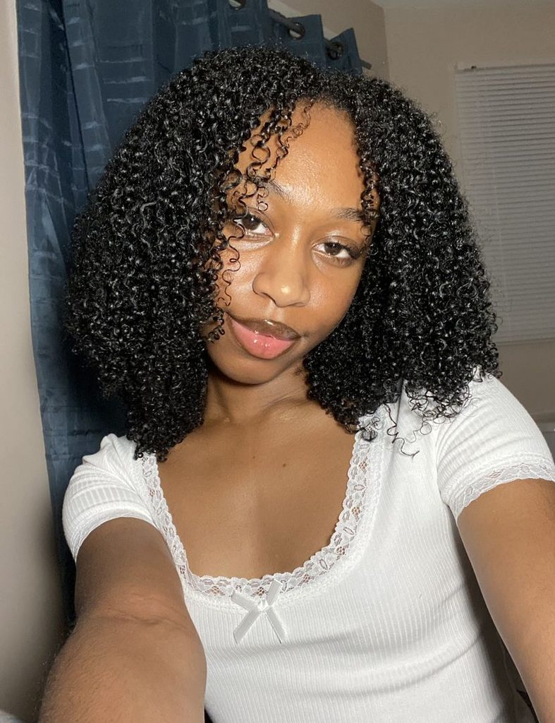 someone with defined wash and go date night hairstyle for afro hair