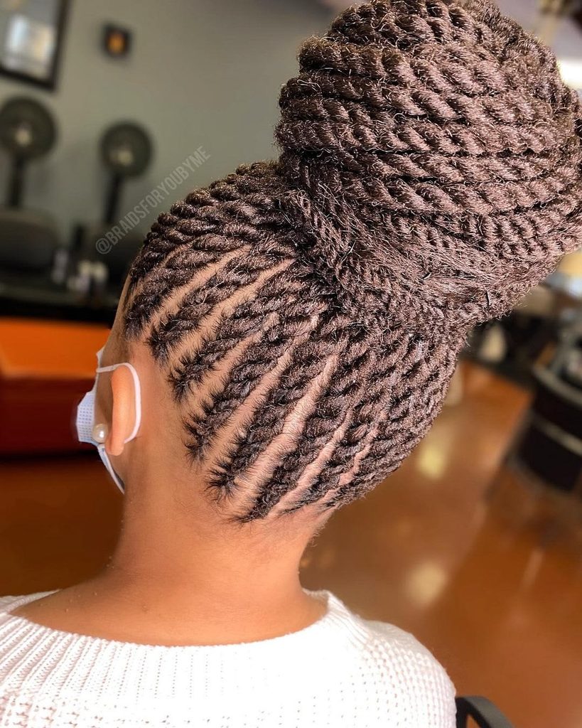 someone with flat twist updo hairstyle for the office