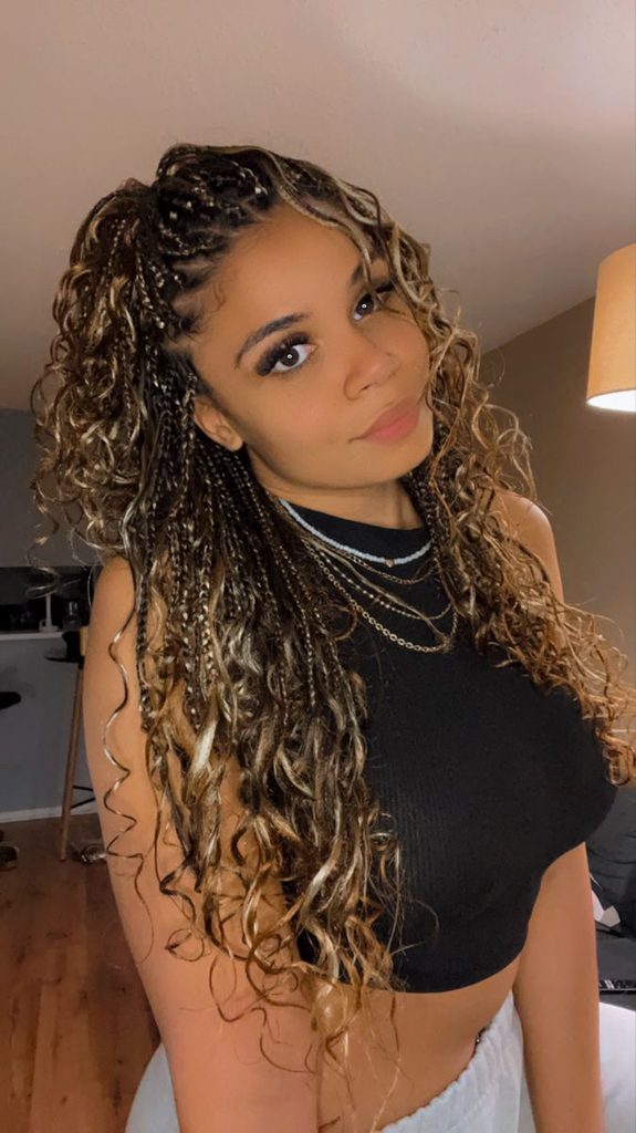 someone with goddess braids pulled back