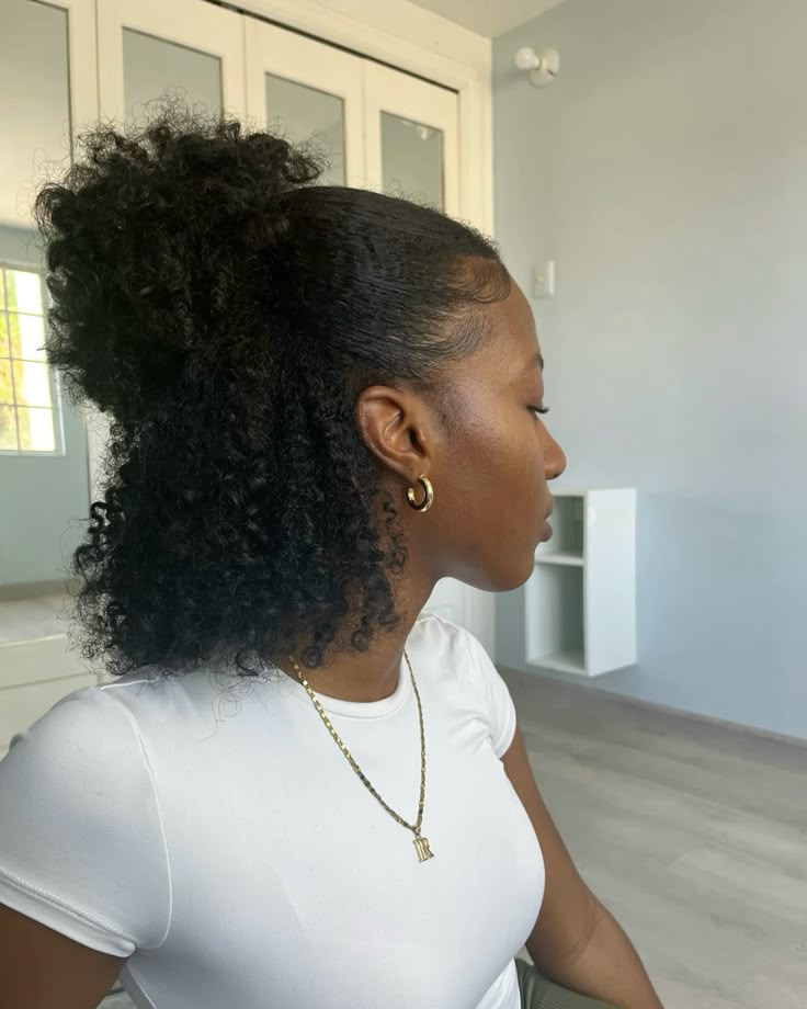 someone with half up half down hair professional hairstyle for the office