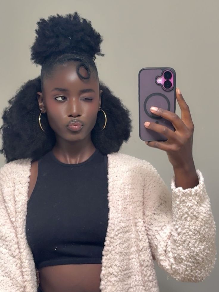 someone with half up puff styles for natural hair
