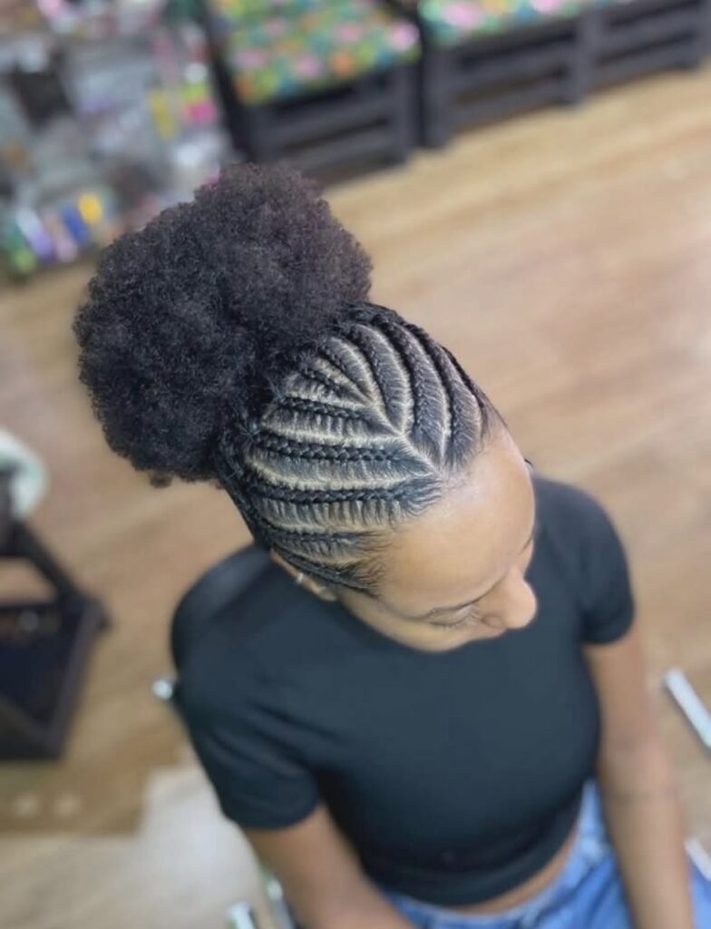 someone with high puff with braided base