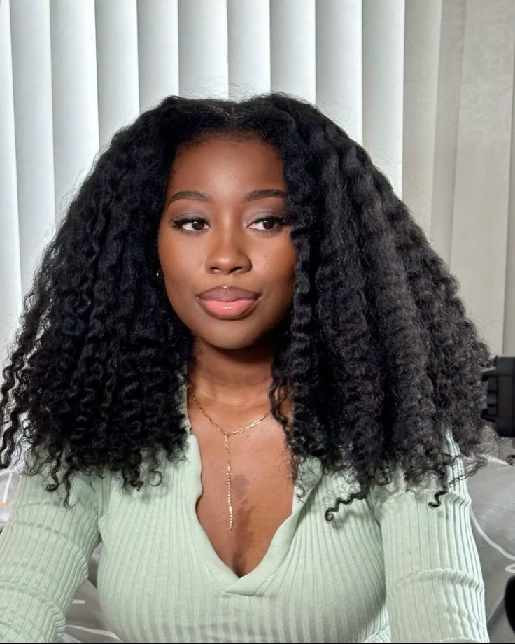 someone with long twist out waves