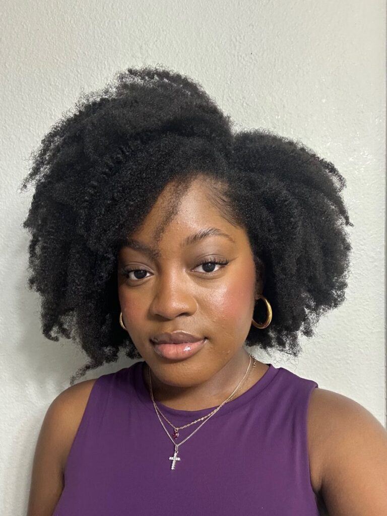 someone with mini natural hair