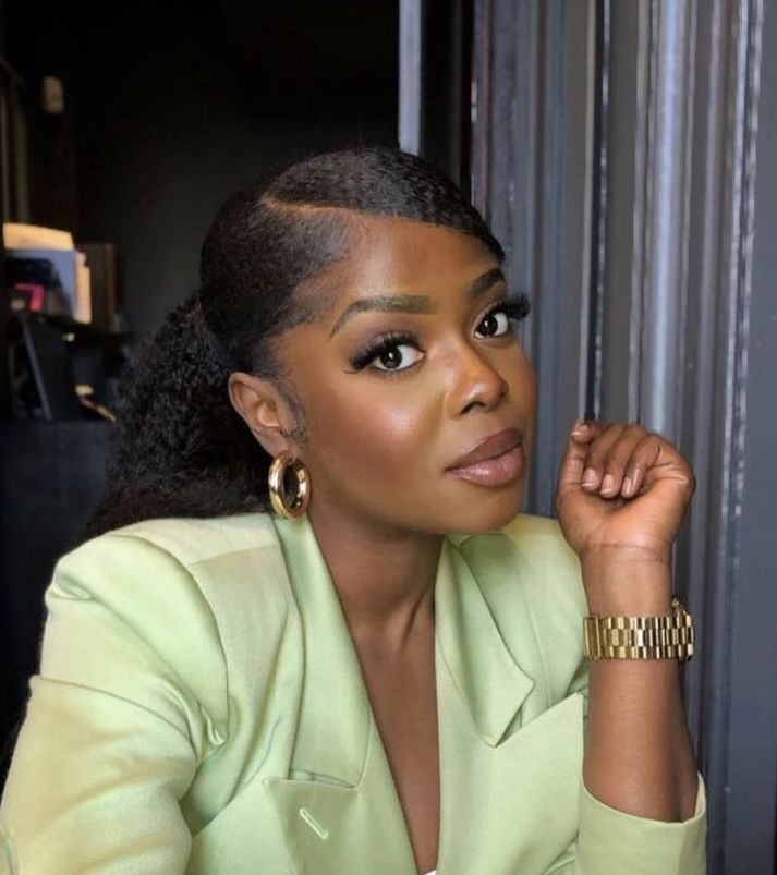 someone with office finish with shine spray professional hairstyle for the office
