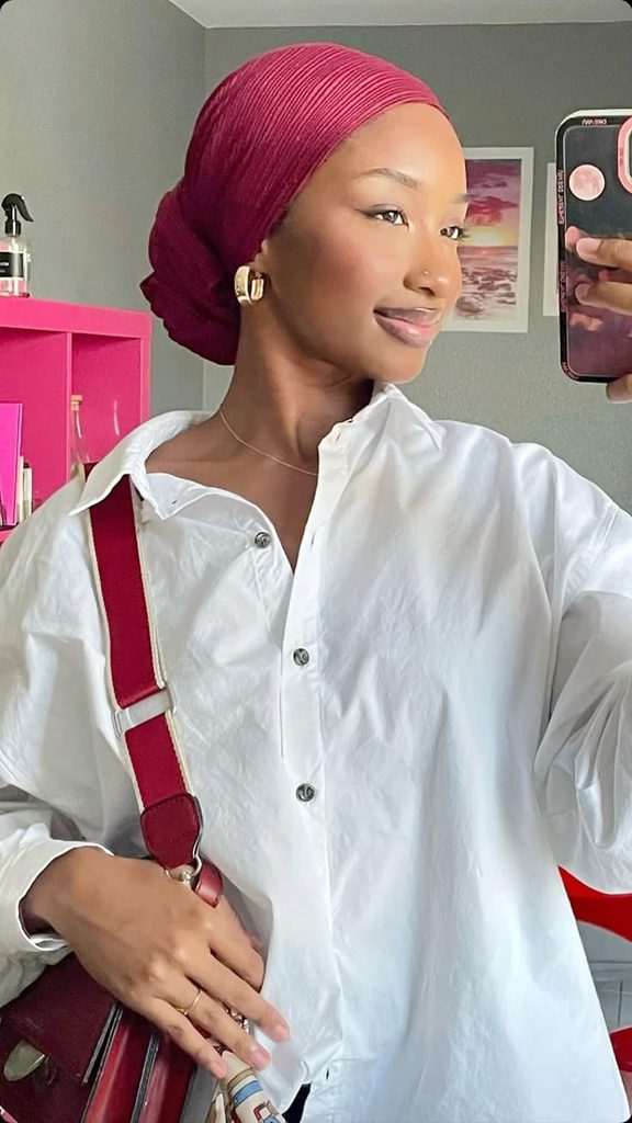 someone with professional headwrap hairstyle for the office