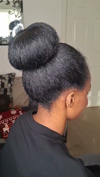 someone with protective bun with extension