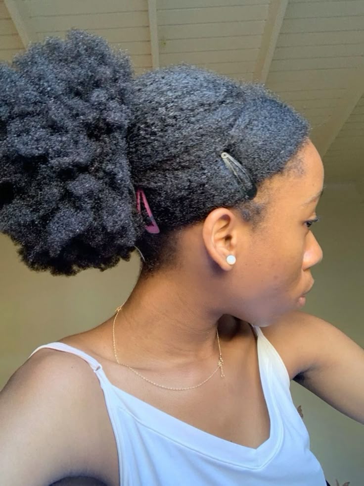 someone with puff on long hair