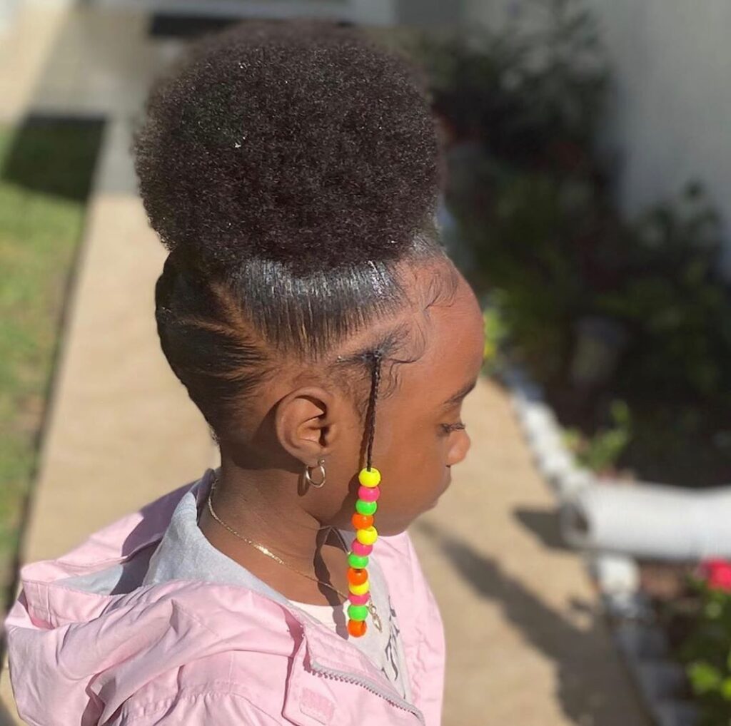 someone with puff with beads