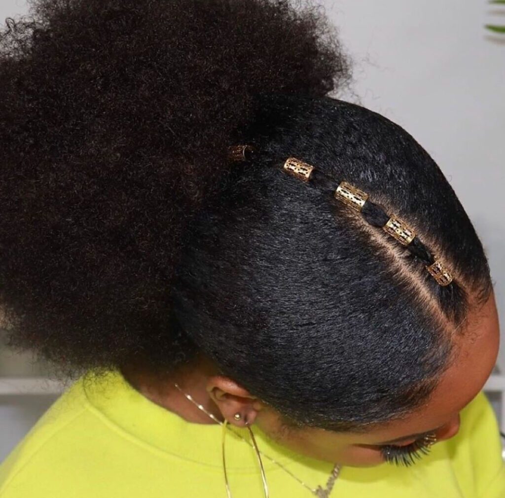 someone with puff with gold cuffs styles for natural hair