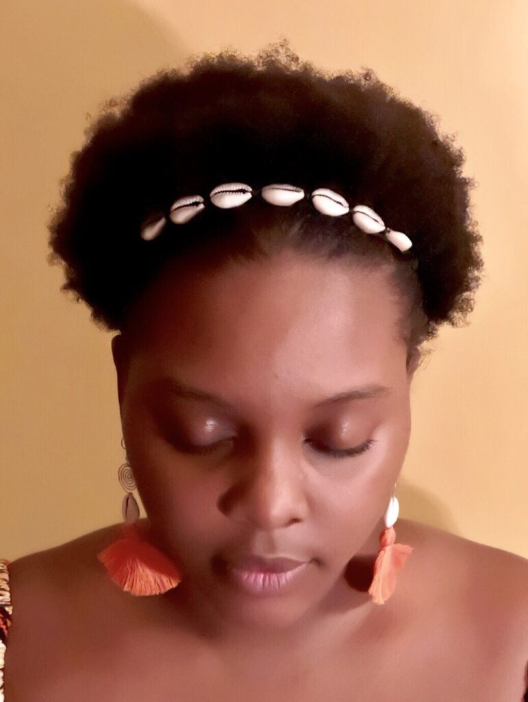 someone with puff with metallic threads