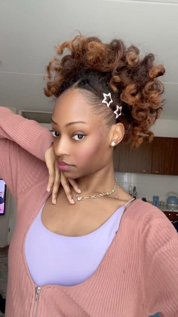someone with puff with rhinestone clips