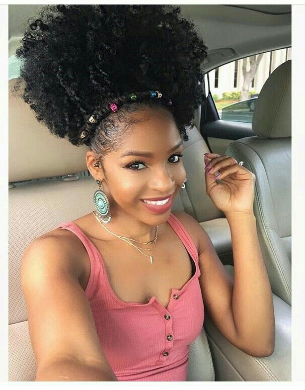 someone with puff with twisted crown