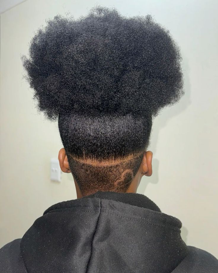 someone with puff with undercut