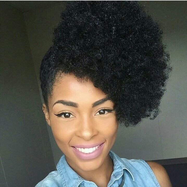 someone with side puff styles for natural hair