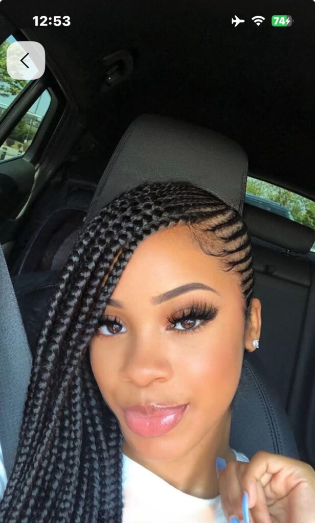 someone with side swept braids
