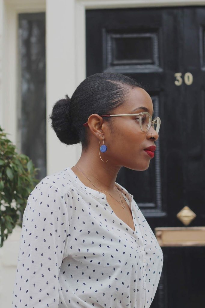 someone with sleek low bun hairstyle for the office