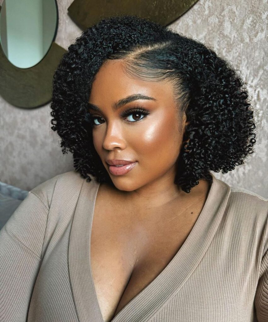 someone with soft round natural hair bob